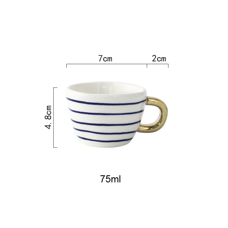 Abstract Geometric Pattern Cup with Gold Handle