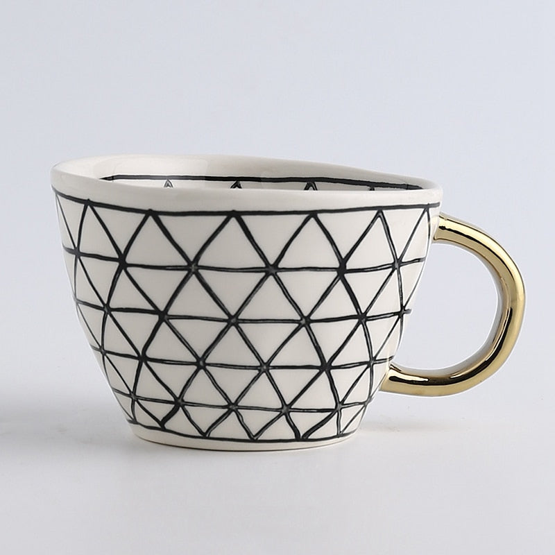 Abstract Geometric Pattern Cup with Gold Handle