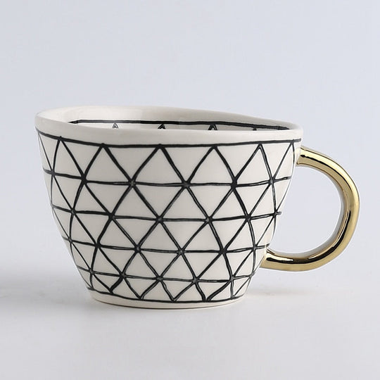 Abstract Geometric Pattern Cup with Gold Handle