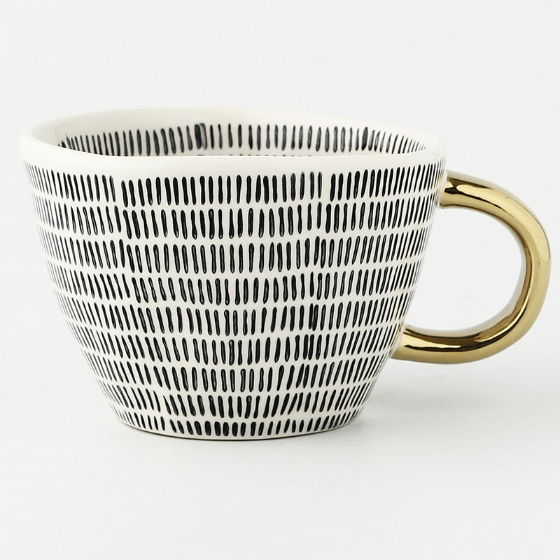 Abstract Geometric Pattern Cup with Gold Handle