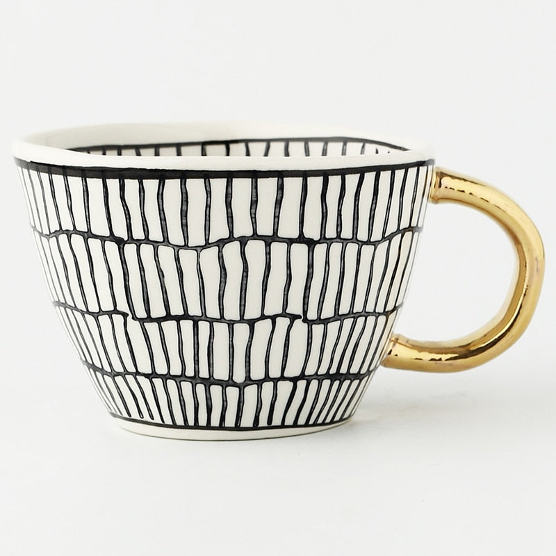 Abstract Geometric Pattern Cup with Gold Handle