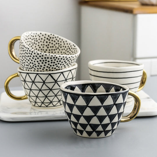 Abstract Geometric Pattern Cup with Gold Handle