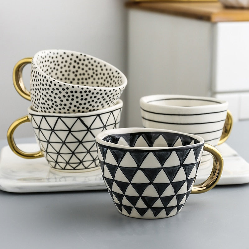 Abstract Geometric Pattern Cup with Gold Handle