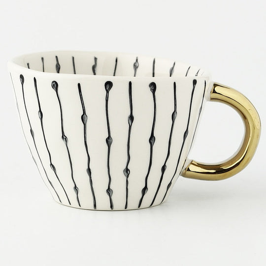 Abstract Geometric Pattern Cup with Gold Handle