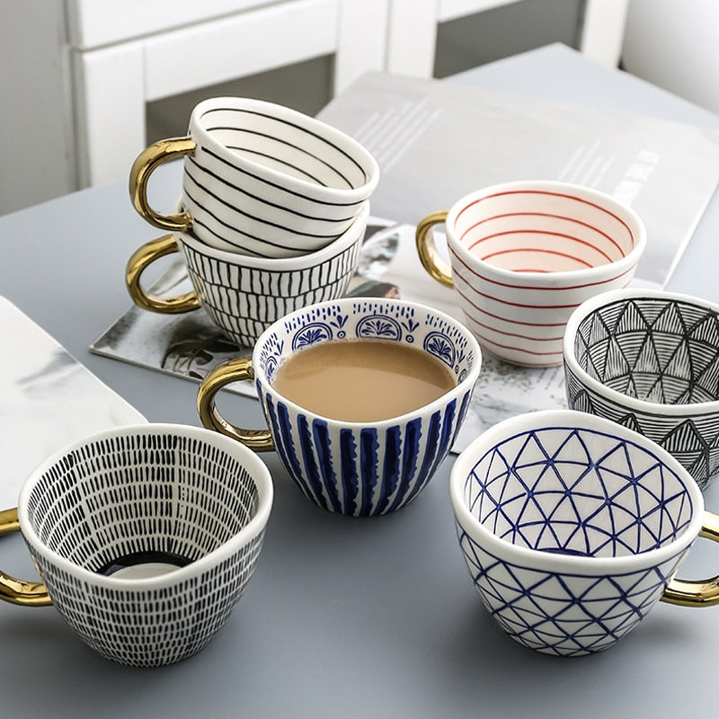 Abstract Geometric Pattern Cup with Gold Handle