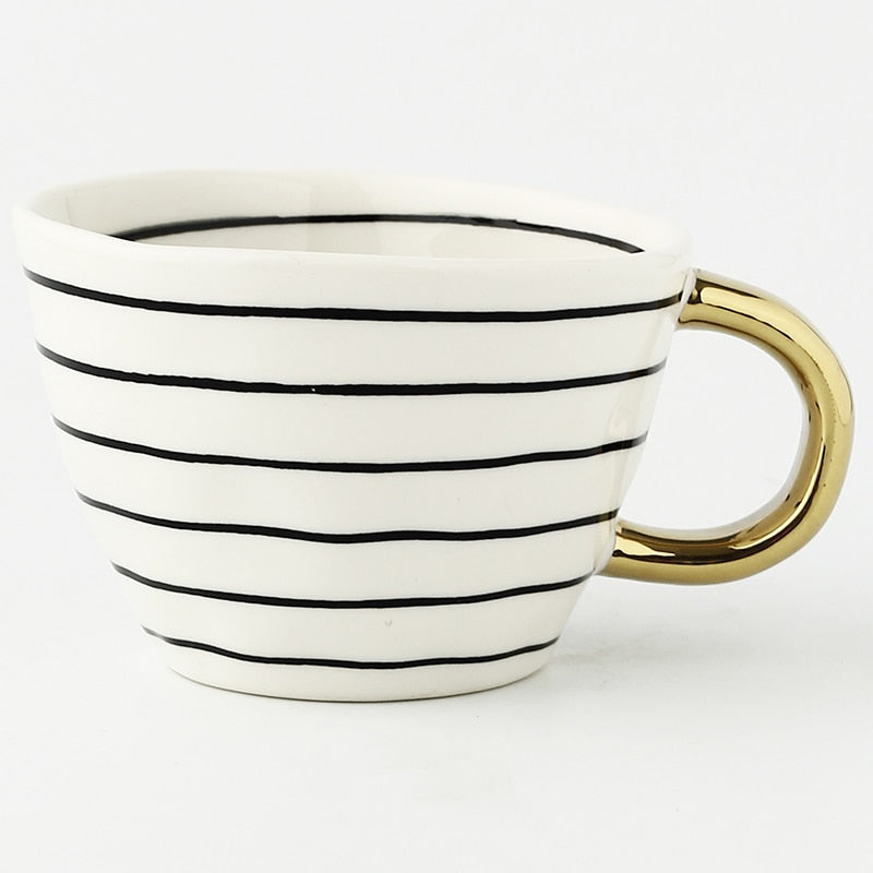 Abstract Geometric Pattern Cup with Gold Handle