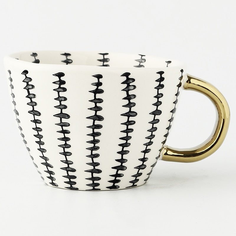 Abstract Geometric Pattern Cup with Gold Handle