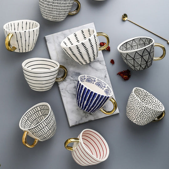 Abstract Geometric Pattern Cup with Gold Handle