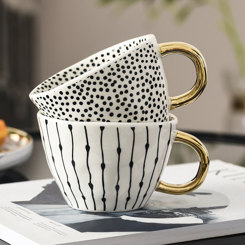 Abstract Geometric Pattern Cup with Gold Handle