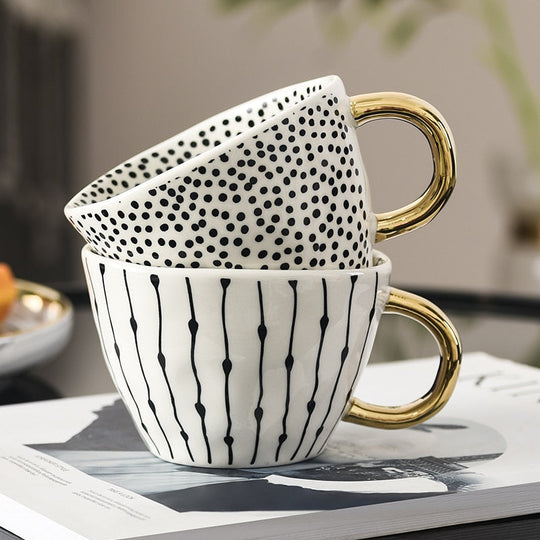Abstract Geometric Pattern Cup with Gold Handle
