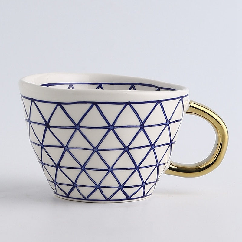 Abstract Geometric Pattern Cup with Gold Handle
