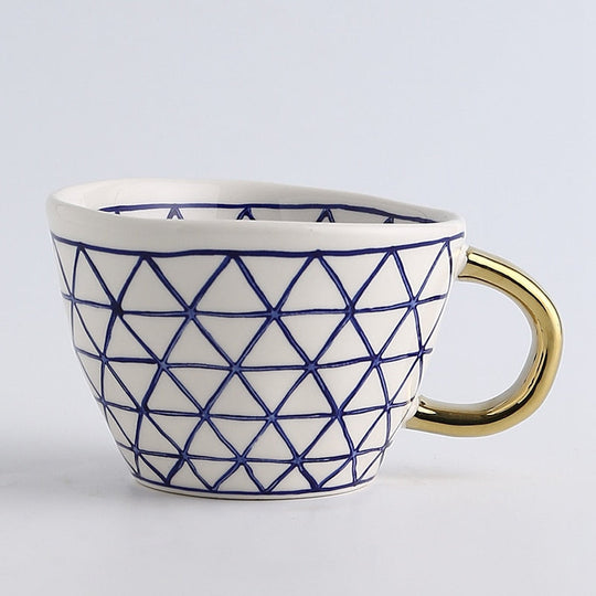 Abstract Geometric Pattern Cup with Gold Handle