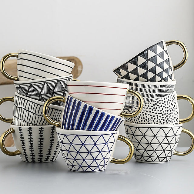 Abstract Geometric Pattern Cup with Gold Handle
