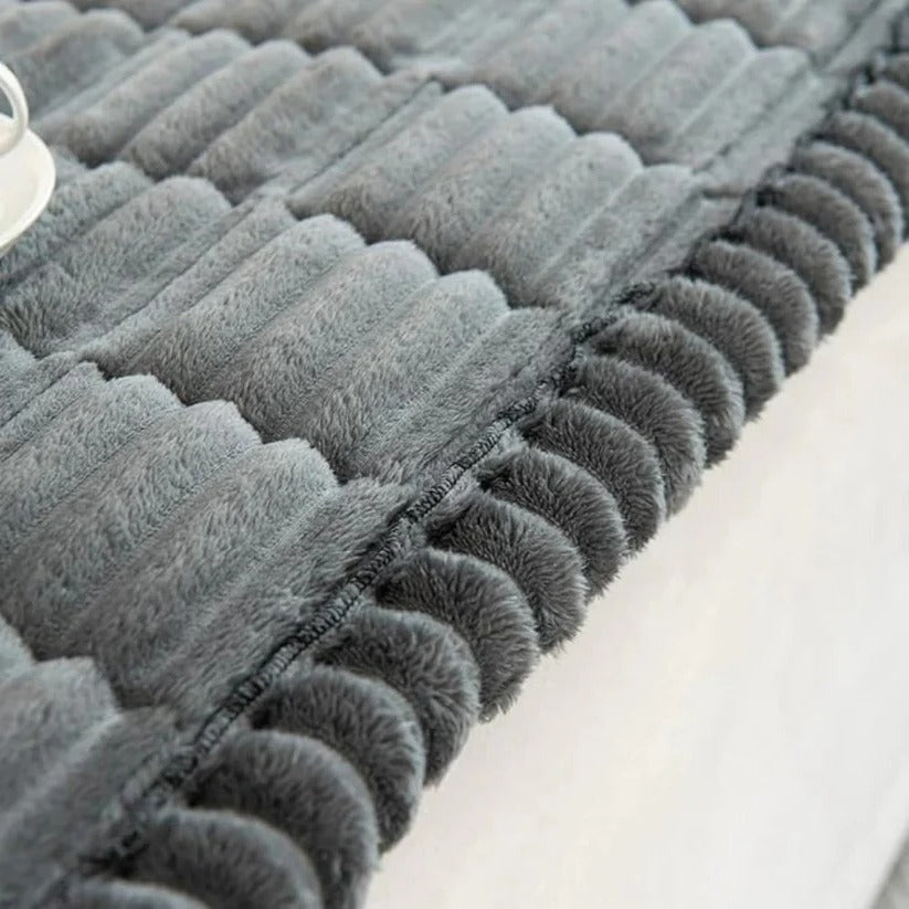 Plush Sofa Slipcover with Pleated Skirt Design