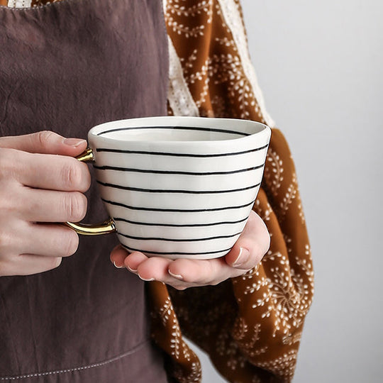 Abstract Geometric Pattern Cup with Gold Handle